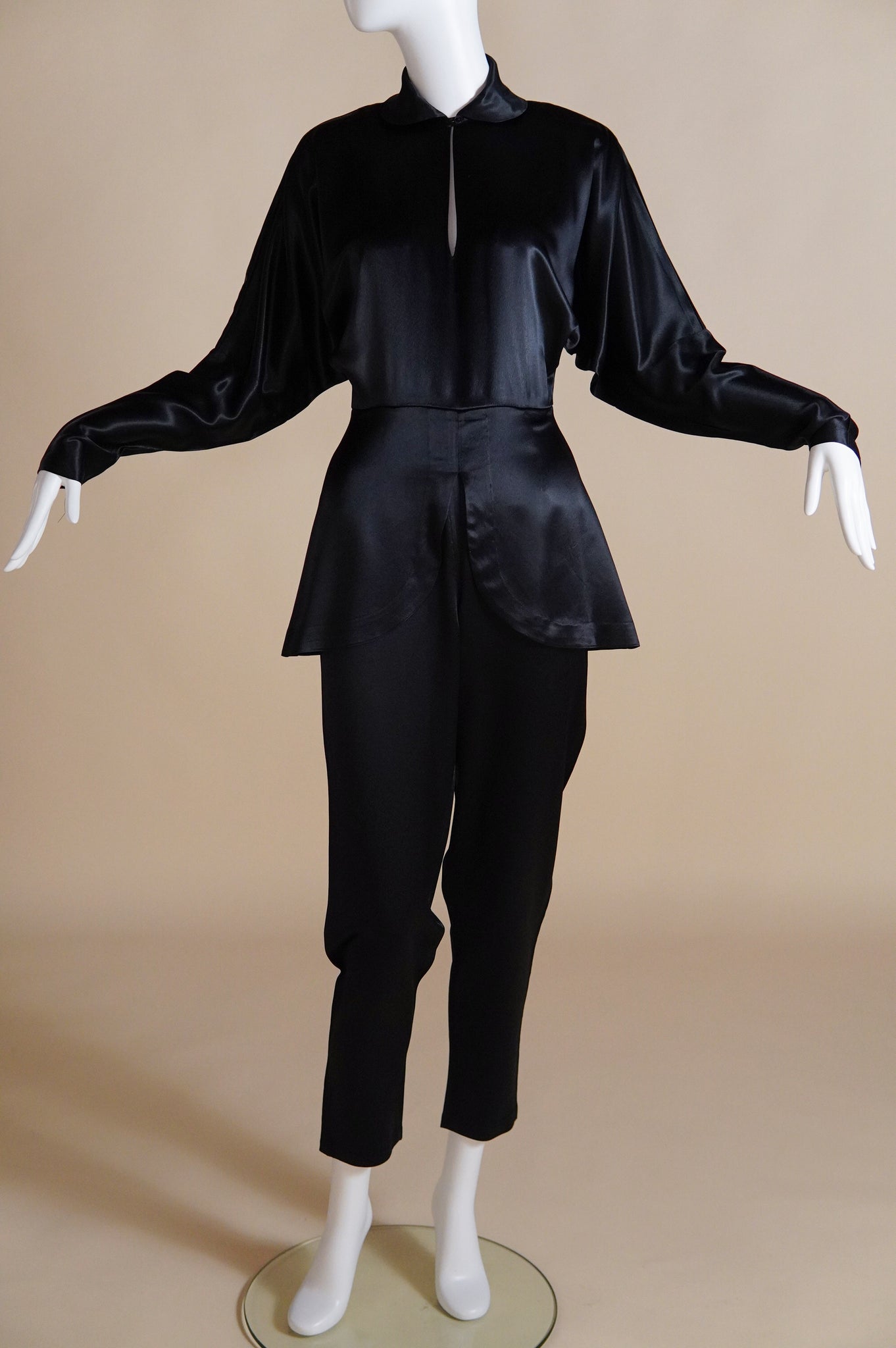 1990s Norma Kamali satin jumpsuit with peplum and keyhole - XS
