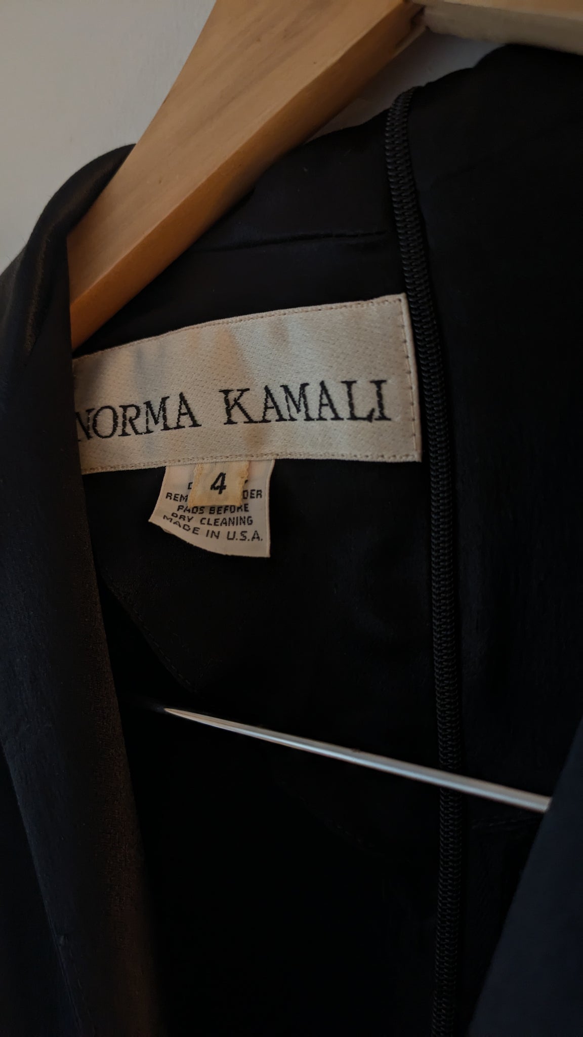 1990s Norma Kamali satin jumpsuit with peplum and keyhole - XS