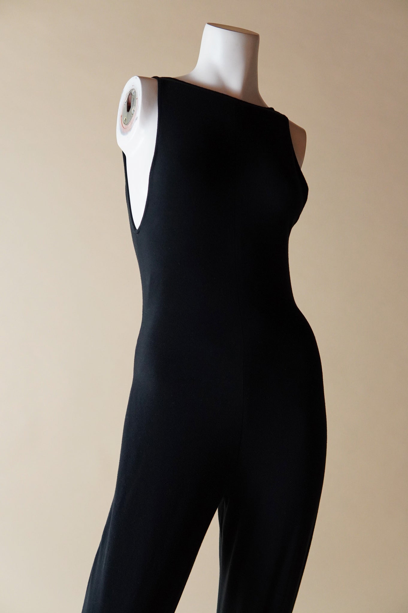 1980s Norma Kamali black jumpsuit with high neck and open back - XS/S