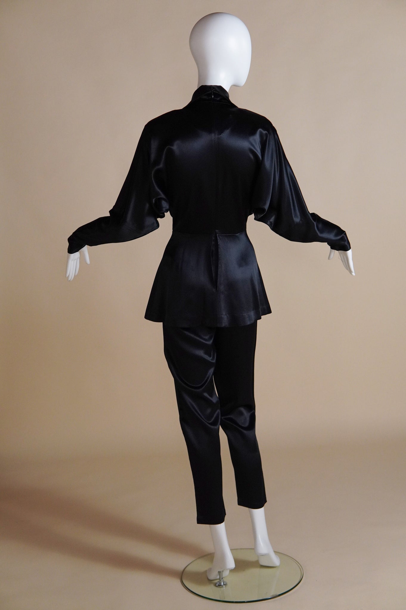 1990s Norma Kamali satin jumpsuit with peplum and keyhole - XS