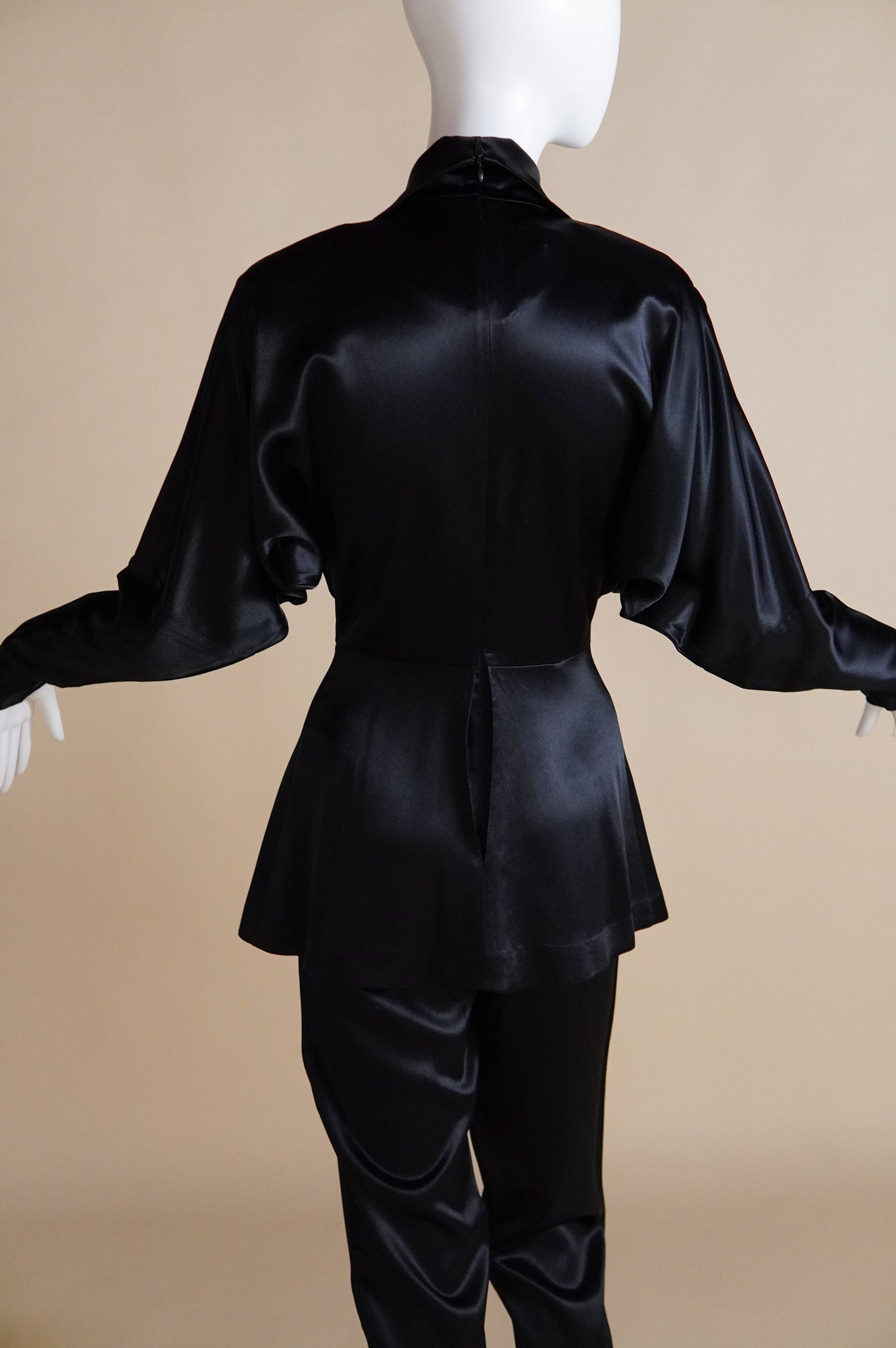 1990s Norma Kamali satin jumpsuit with peplum and keyhole - XS