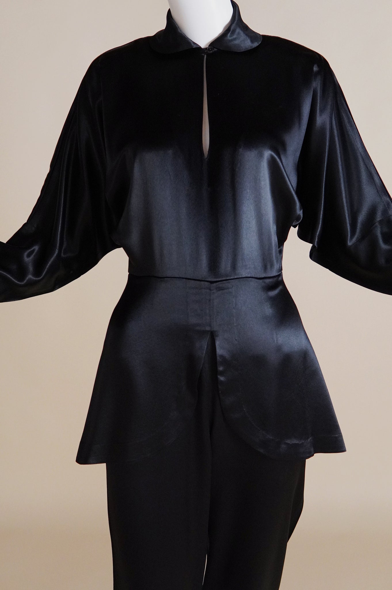 1990s Norma Kamali satin jumpsuit with peplum and keyhole - XS